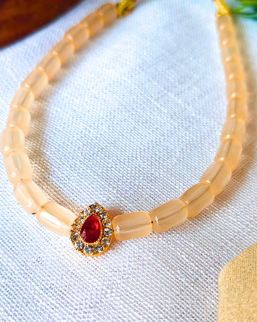 Regal Glow Teardrop Necklace